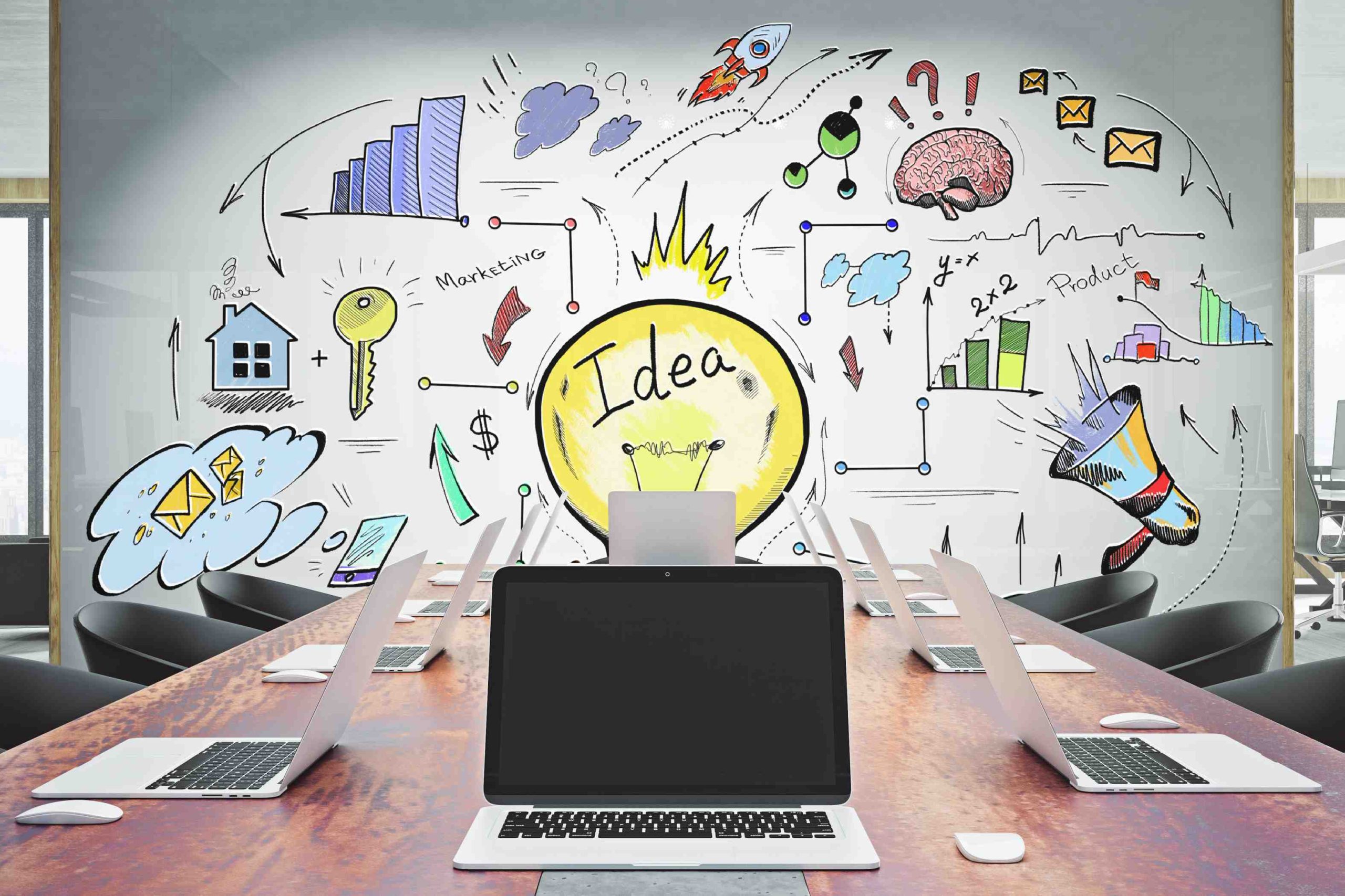 empty laptop with business sketch